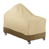 Classic Accessories Veranda cover, top view, shielding a 60-inch Kamado from rain and sun.
