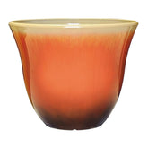 Classic Home and Garden Honeysuckle planter closeup shows durable resin and vibrant Tequila Sunrise color.