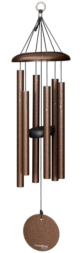 Corinthian Bells copper vein wind chime on patio for tranquil ambience.