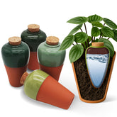 Cozy Chrysalis terracotta self-watering insert set4 shown for root hydration in a planter