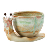 Creative Co-Op snail planter with base and saucer adds whimsy to garden décor