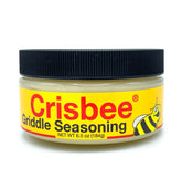 Crisbee Griddle Seasoning bottle pouring for easy, durable nonstick coating.