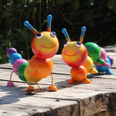 Cruis Cuka metal caterpillar statue adds colorful garden focal point with UV-protected finish.
