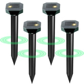 Cvtayn snake, mole, rabbit, and skunk deterrent in solar-powered yard setup.