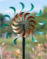 Cyan Oasis Wind Spinner in the yard creates a vibrant focal point.