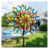 Cyan Oasis wind spinner on stake for durable outdoor motion in the garden