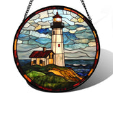 DASTOLL Ocean Lighthouse stained glass window hanging catching sunlight with vivid blue-green tones.