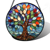 DASTOLL stained glass Tree of Life window hanging glows with vibrant colors in natural light