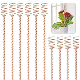 Dayimado electroculture stakes in soil for enhanced crop potential.