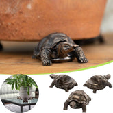 DecoVista tortoise resin pot feet elevate planters with decorative charm and sturdy support.