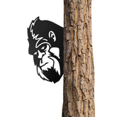 Dekorbay Sasquatch Peek sign on wall, weather-resistant yard art.
