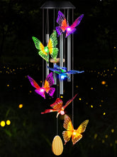 DesGully Butterfly Solar Wind Chimes on garden stake with color-changing glow for evenings.