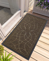 DEXI front door mat at outdoor entrance capturing dirt at the threshold
