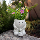 Dolkgy face planter head vase adds whimsical charm to indoor displays with real or faux plants