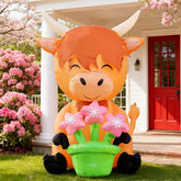 DomKom 5ft Highland Cow inflatable stands tall in the yard, a playful outdoor focal point.