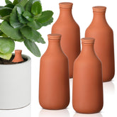 DoubleFill terracotta watering globe 24oz providing steady soil moisture.