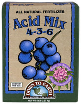 Down To Earth Acid Mix bottle being poured for precise feeding.