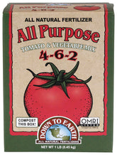 Down To Earth bottle front showing organic tomato-vegetable mix for healthier harvests.