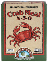 Down To Earth crab meal bottle pour demonstrating steady garden nutrition