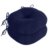 Downluxe Bistro navy round outdoor chair cushion with non-slip ties for secure patio seating.