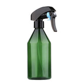 Driew plant mister bottle with green design emitting a gentle mist for indoor plants