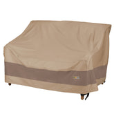 Duck Covers Elegant waterproof loveseat cover protects a 52-inch outdoor sofa from rain and debris.