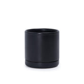 D'vine Dev 3.5-inch ceramic planter showing drainage hole and saucer for tidy roots.