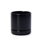 Dvine Dev 4.7-inch ceramic planter with drainage hole for healthy soil drainage.