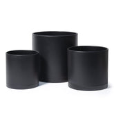 D'vine Dev 8-inch planter front view with drainage holes for easy watering.