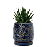 D'vine Dev embossed leaves planter in midnight blue for stylish indoor greenery.