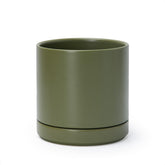 D'vine Dev olive ceramic planter front view enhances indoor decor with a sleek cylindrical form.