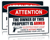 Dxsigns attention sign enhances outdoor visibility with bold red lettering.