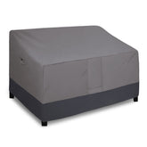 Easy-Going heavy-duty loveseat cover in gray protects a sofa from rain and sun.