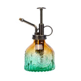 Ebristar glass plant mister with green-brown gradient and metal pump.