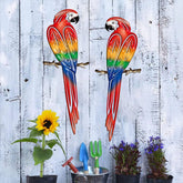 EiGreen 2pcs red parrot wall art for outdoor fences adds vibrant color.