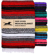 El Paso Designs Mexican Yoga Blanket red tassel close-up showing hand-tied detail for authentic warmth