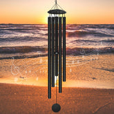 Elecxlink 65-inch wind chimes outdoors showing deep tone resonance