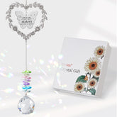 Elivida Suncatcher heart wreath casts vivid rainbows through sunny windows.