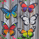 EOORAU metal butterfly wall art with vibrant colors for garden accents