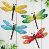 EOORAU metal dragonfly wall decor on fence adds bright outdoor color.