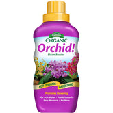 Espoma Orchid Organic Fertilizer bottle pouring for simple dosing at home.