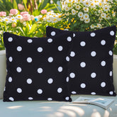 Eternal Beauty outdoor pillow cover in black-white polka dot offers weather resistance.