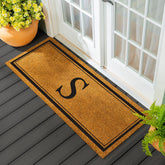 Evergreen Flag monogram coir doormat 60x24 for durable outdoor use.