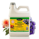 EZ-GRO Blossom Booster bottle being poured to promote vibrant indoor blooms.