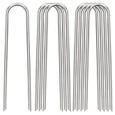 FAAYUCK 12-inch landscape staples secure weed barrier fabric in windy conditions.