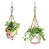 FALESHOS rainbow macrame hanger 17.9in holding a lush indoor plant for colorful decor