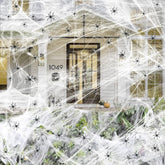 Famoby cobweb roll spanning 1200 sqft for dramatic Halloween ambiance indoors or outdoors