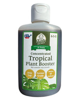 Farmer's Secret tropical booster bottle powers lush indoor plant growth.