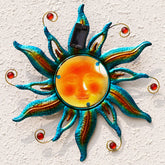 Fashionoda solar sun face wall art in blue with LED glow for outdoor ambiance.