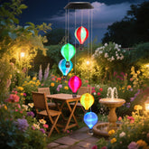 Fasohere solar wind chimes outdoor balloon LED lights create ambient color shifts at night.